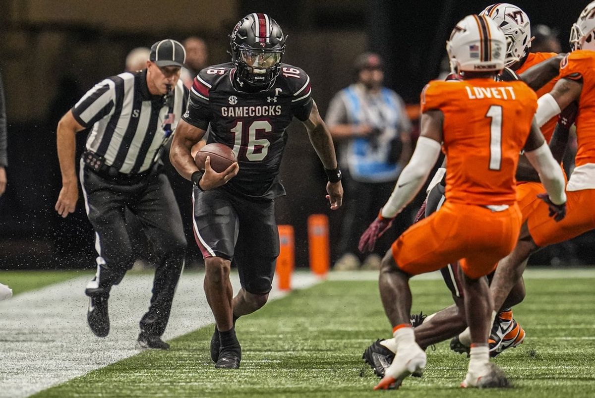 Aug 31, 2025; Atlanta, Georgia, USA; South Carolina Gamecocks quarterback LaNorris Sellers (16) runs on the sideline against the Virginia Tech Hokies during the first quarter at Mercedes-Benz Stadium. Mandatory Credit: Dale Zanine-Imagn Images