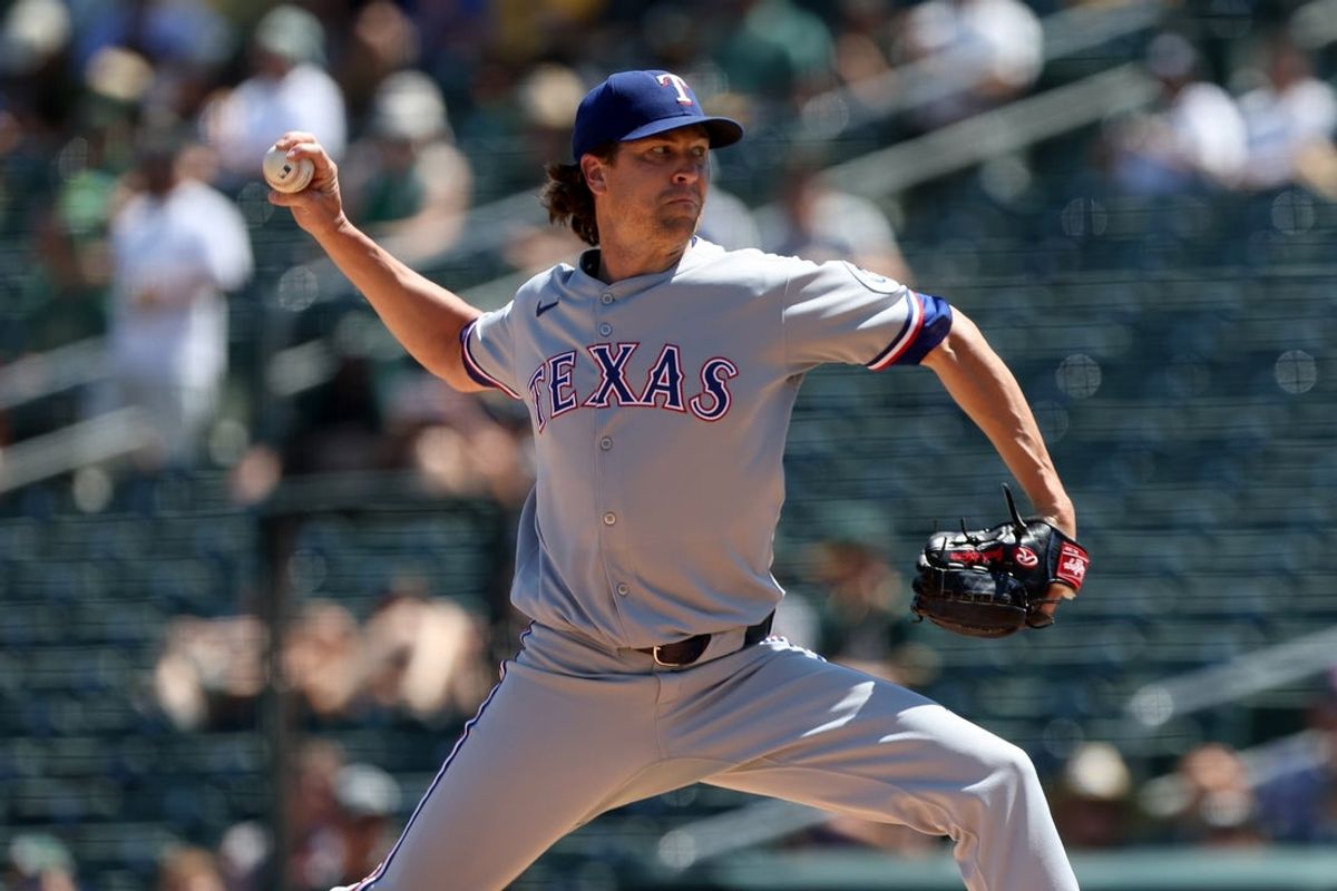 Aug 31, 2025; West Sacramento, California, USA; Texas Rangers starting pitcher Jacob deGrom (48) throws a pitch against the Athletics during the first inning at Sutter Health Park. Mandatory Credit: Dennis Lee-Imagn Images