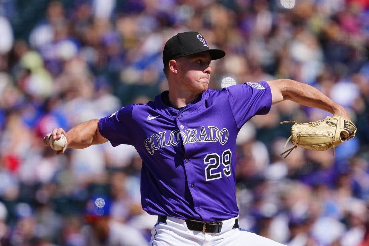 Aug 31, 2025; Denver, Colorado, USA; Colorado Rockies starting pitcher Tanner Gordon (29) delivers a pitch in the fifth inning against the Chicago Cubs at Coors Field. Mandatory Credit: Ron Chenoy-Imagn Images