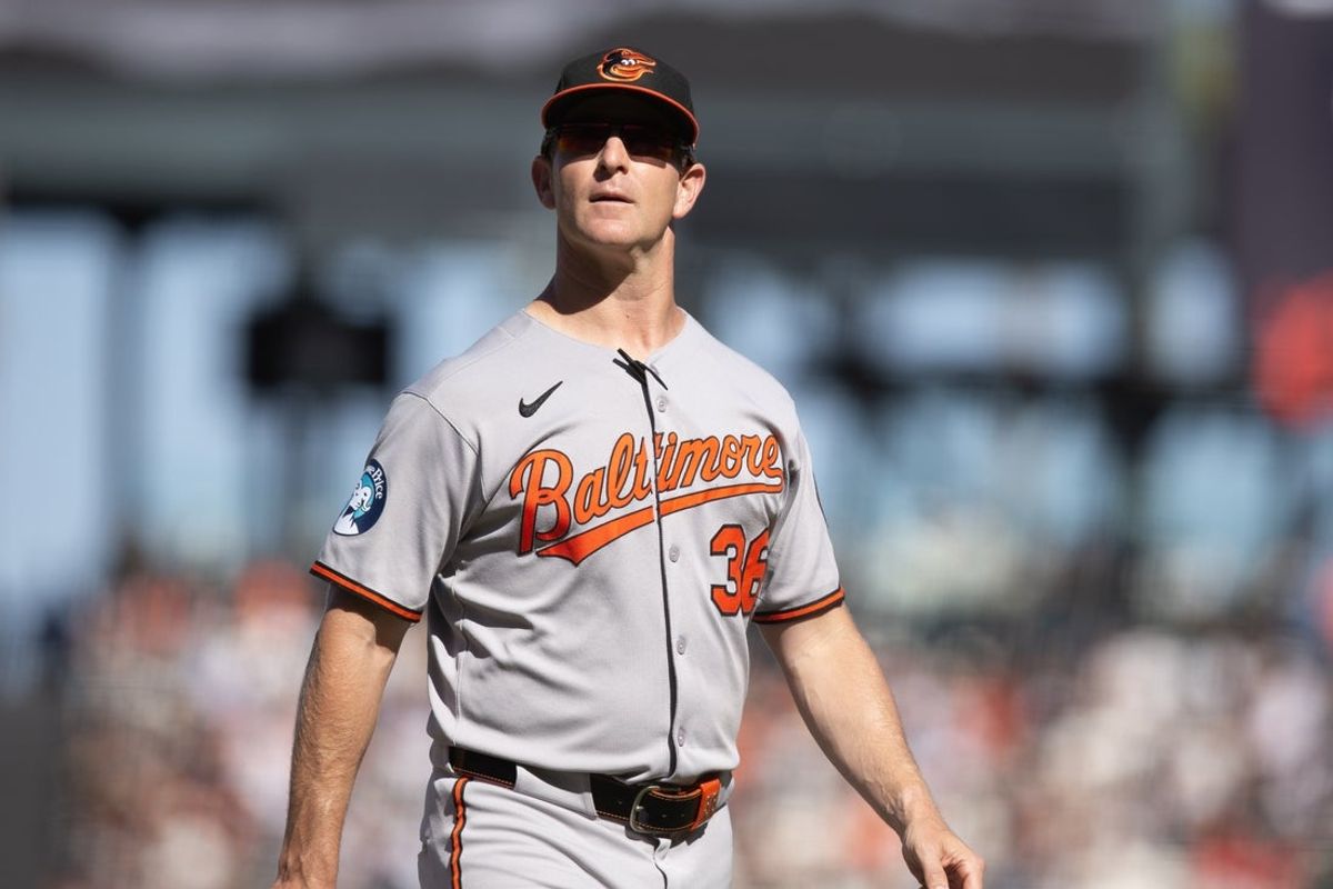 Aug 31, 2025; San Francisco, California, USA; Baltimore Orioles interim manager Tony Mansolino (36) walks back to the dugout after getting the explanation for an interference call against his team that resulted in a double play during the eighth inning against the San Francisco Giants at Oracle Park. Mandatory Credit: D. Ross Cameron-Imagn Images