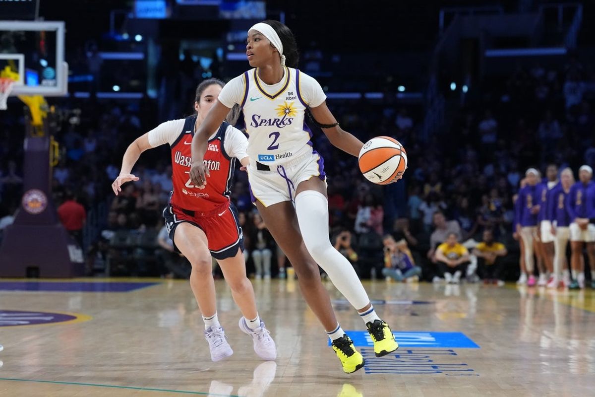 Aug 31, 2025; Los Angeles, California, USA; LA Sparks forward Rickea Jackson (2) dribbles the ball against Washington Mystics guard Sonia Citron (22) in the first half at Crypto.com Arena. Mandatory Credit: Kirby Lee-Imagn Images