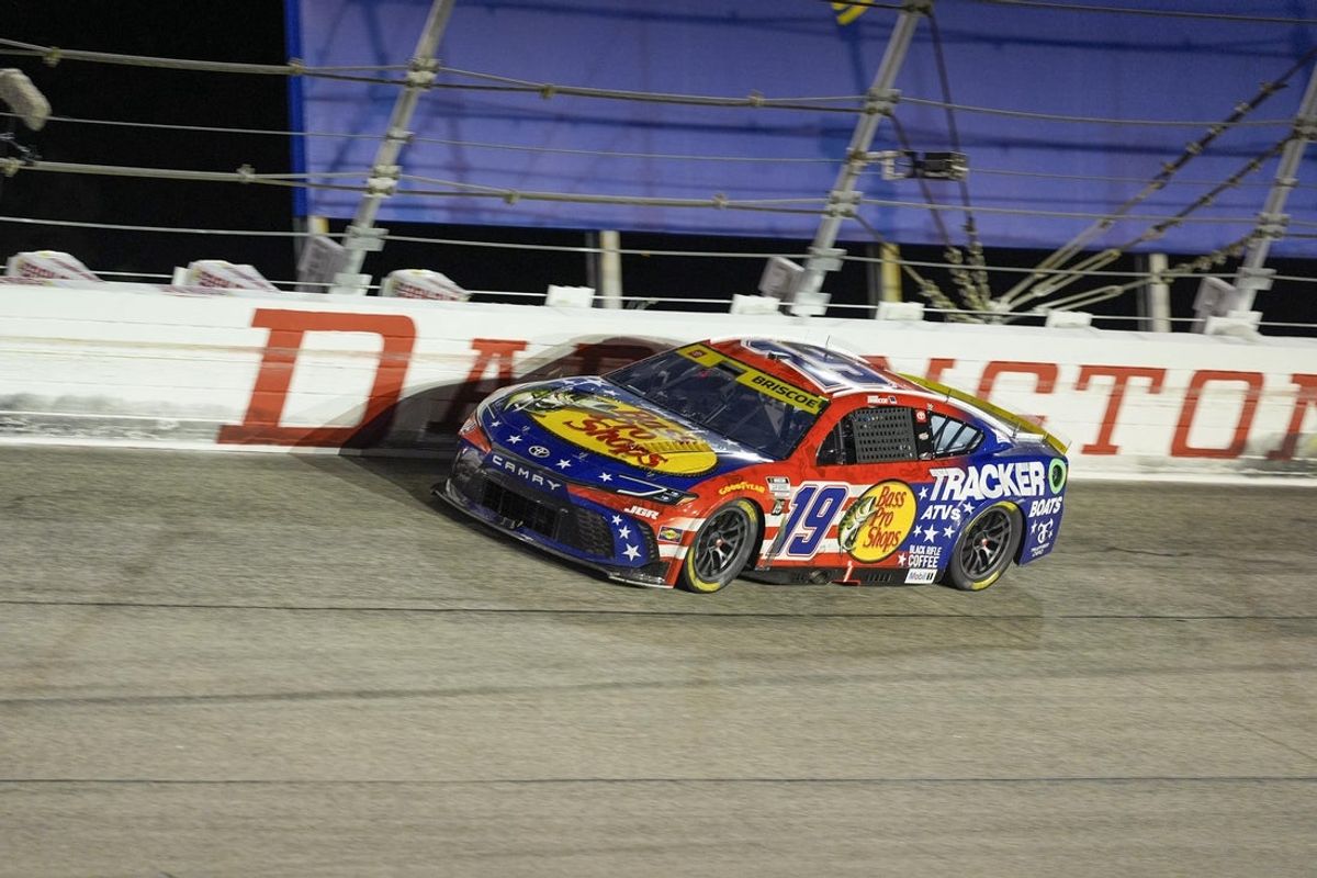 Aug 31, 2025; Darlington, South Carolina, USA; NASCAR Cup Series driver Chase Briscoe (19) between turns one and two  during the Cookouts Southern 500 at Darlington Raceway. Mandatory Credit: Jim Dedmon-Imagn Images
