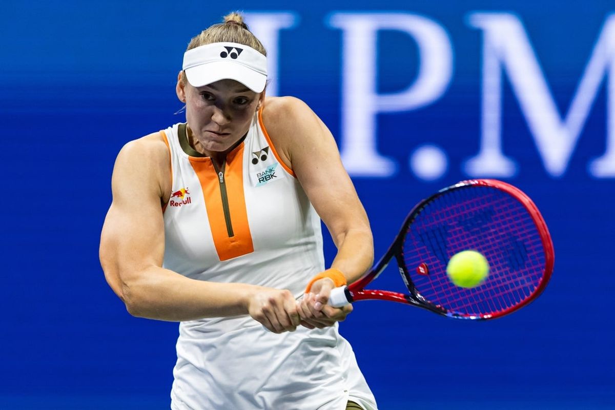 Aug 31, 2025; Flushing, NY, USA; Elena Rybakina of Kazakhstan in action against Marketa Vondrousova of Czech Republic in the fourth round of the women’s singles at the US Open at Arthur Ashe Stadium in Billie Jean King National Tennis Center. Mandatory Credit: Mike Frey-Imagn Images