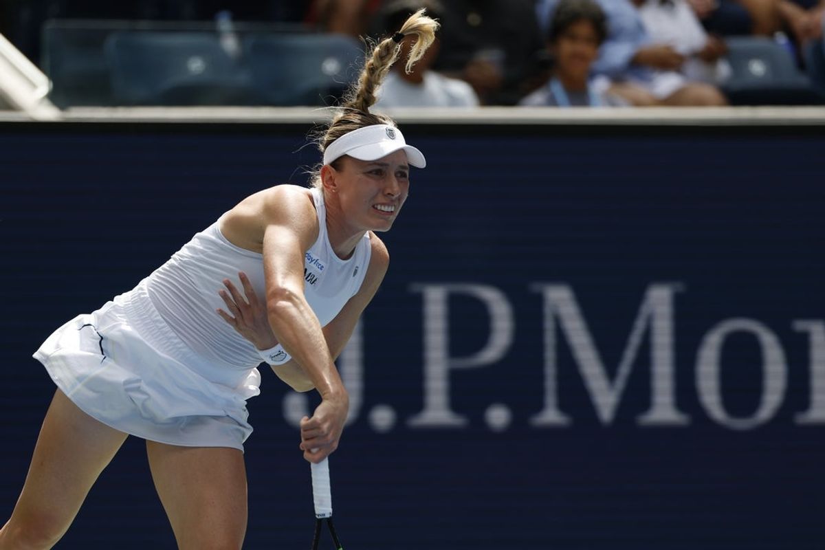 Sep 1, 2025; Flushing, NY, USA; Ekaterina Alexandrova serves against Iga Swiatek (POL) (not pictured) on day nine of the 2025 US Open tennis championships at Billie Jean King National Tennis Center. Mandatory Credit: Geoff Burke-Imagn Images