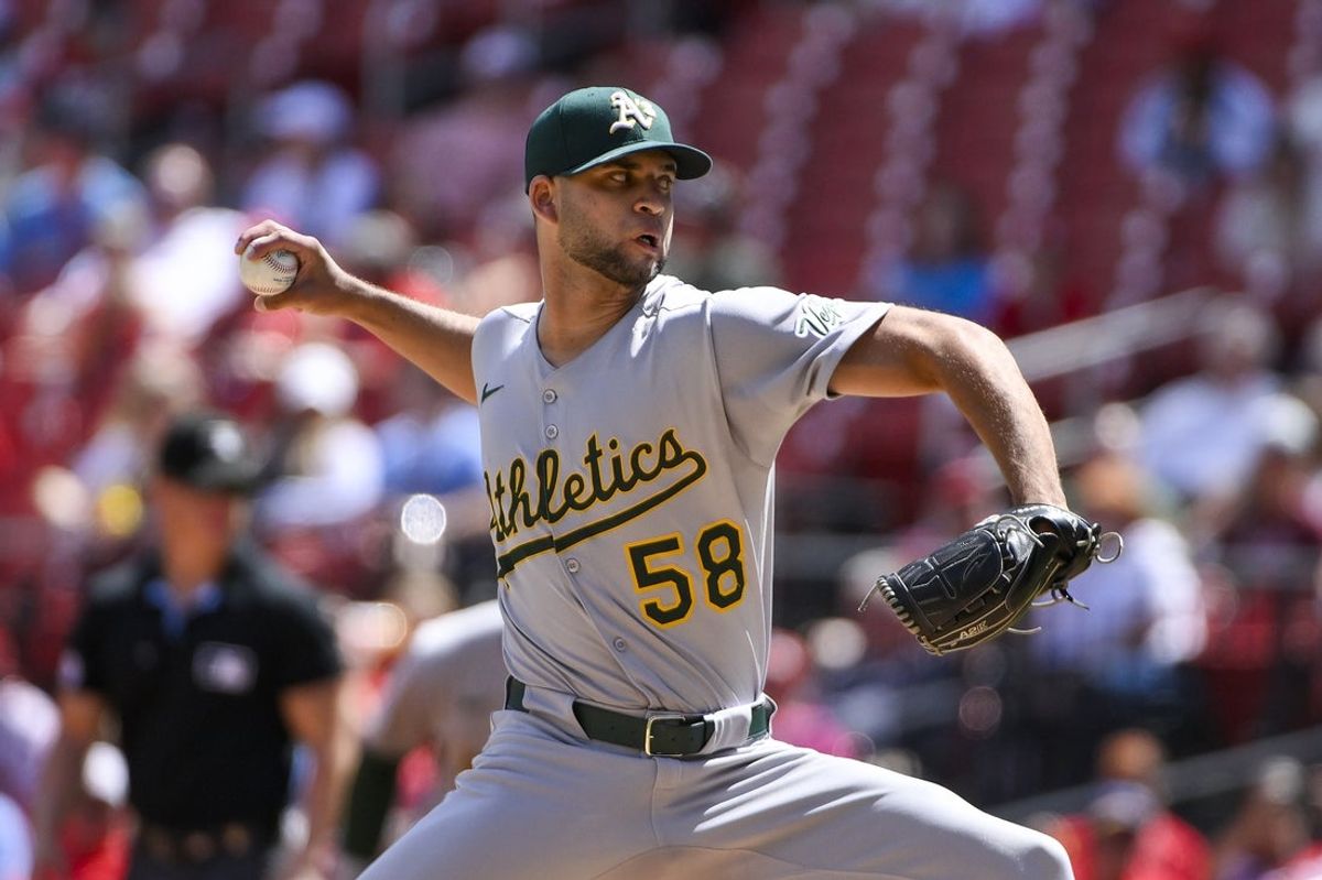 Sep 1, 2025; St. Louis, Missouri, USA;  Athletics starting pitcher Luis Morales (58) pitches against the St. Louis Cardinals during the first inning at Busch Stadium. Mandatory Credit: Jeff Curry-Imagn Images