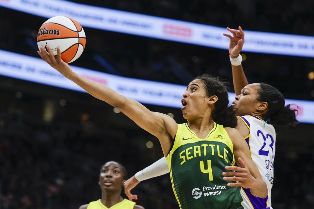Sep 1, 2025; Seattle, Washington, USA; Seattle Storm guard Skylar Diggins (4) shoots a layup against Los Angeles Sparks forward Azura Stevens (23) during the second quarter at Climate Pledge Arena. Mandatory Credit: Joe Nicholson-Imagn Images