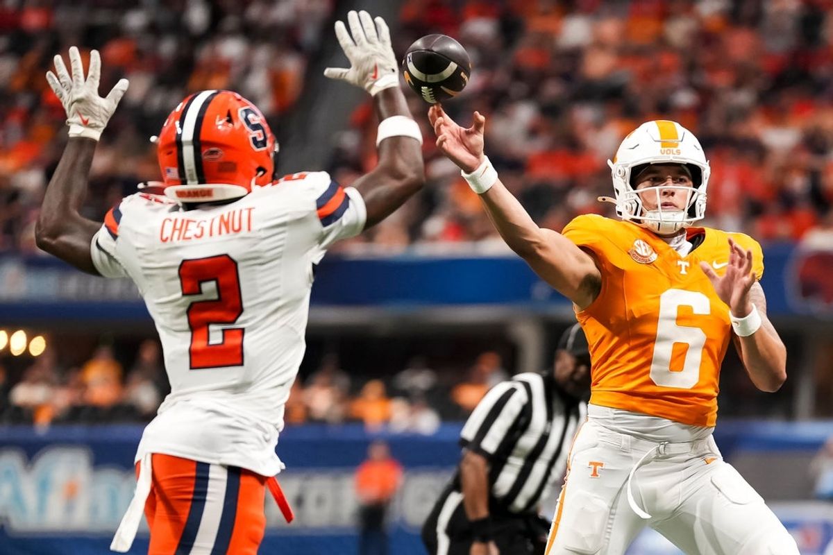 Tennessee quarterback Joey Aguilar (6) throws past Syracuse defensive back Duce Chestnut (2) during the Aflac Kickoff Game between the Volunteers and Syracuse held at Mercedes-Benz Stadium in Atlanta, Ga., on August 30, 2025.