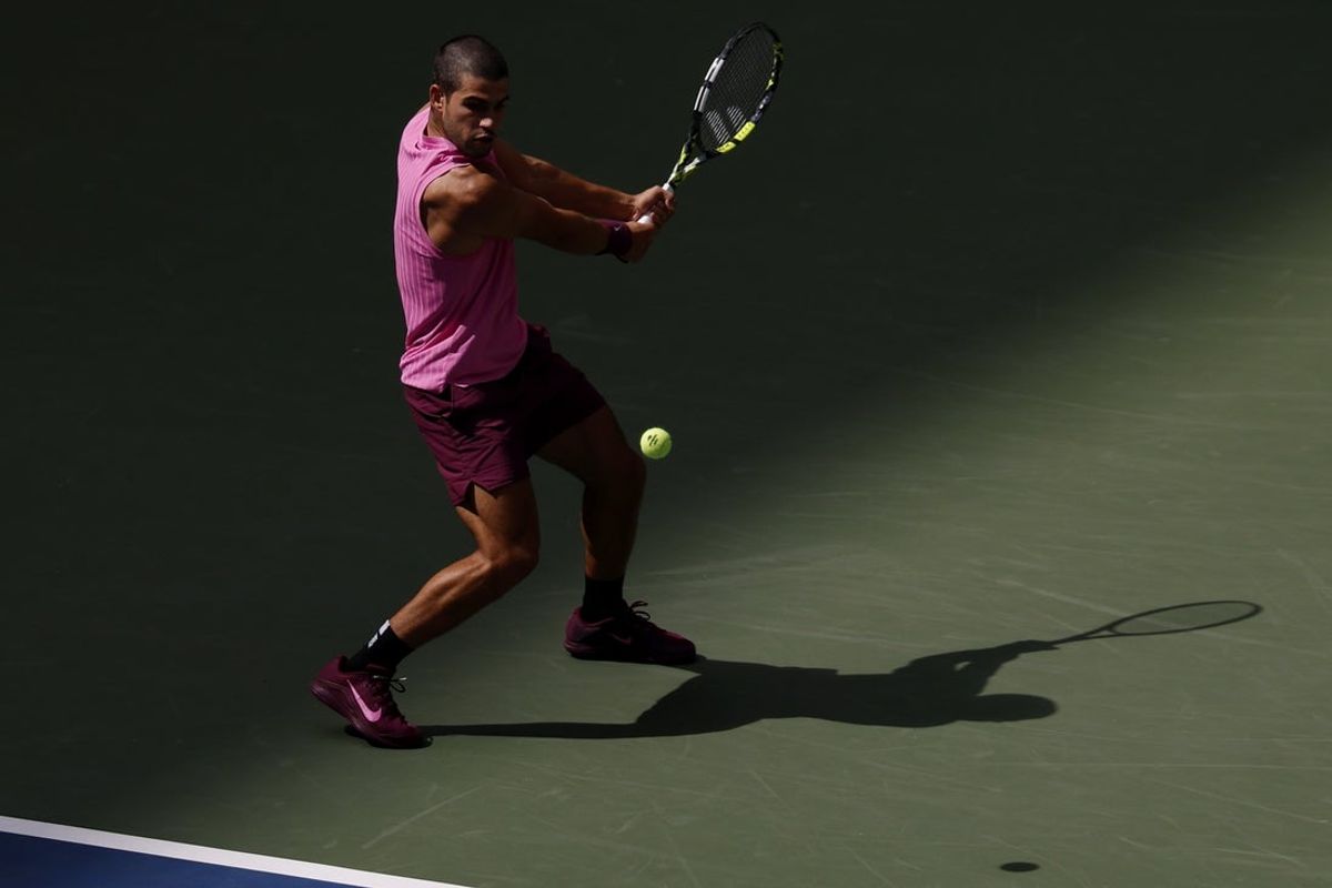Sep 2, 2025; Flushing, NY, USA; Carlos Alcaraz (ESP) hits a backhand against Jiri Lehecka (CZE) (not pictured) on day ten of the 2025 US Open tennis championships at Billie Jean King National Tennis Center. Mandatory Credit: Geoff Burke-Imagn Images
