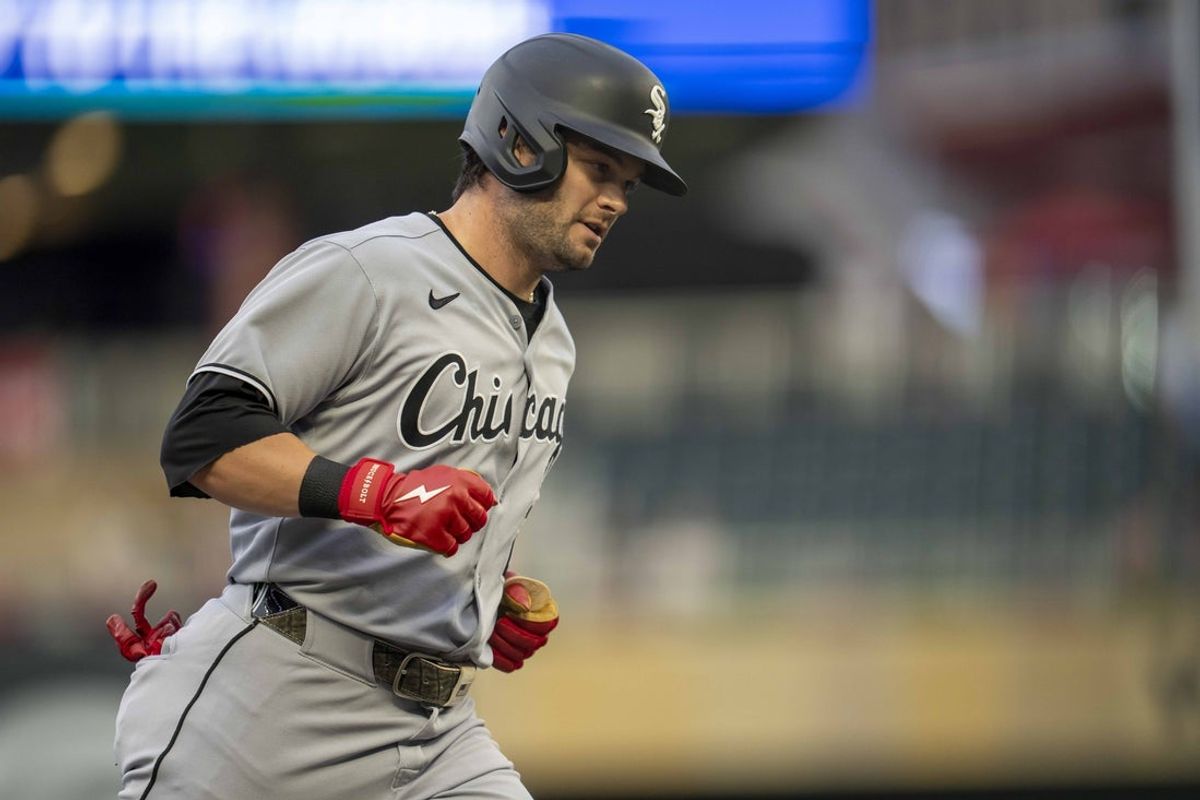 Sep 2, 2025; Minneapolis, Minnesota, USA; Chicago White Sox left fielder Andrew Benintendi (23) rounds third base after hitting a home run against the Minnesota Twins in the second inning at Target Field. Mandatory Credit: Jesse Johnson-Imagn Images