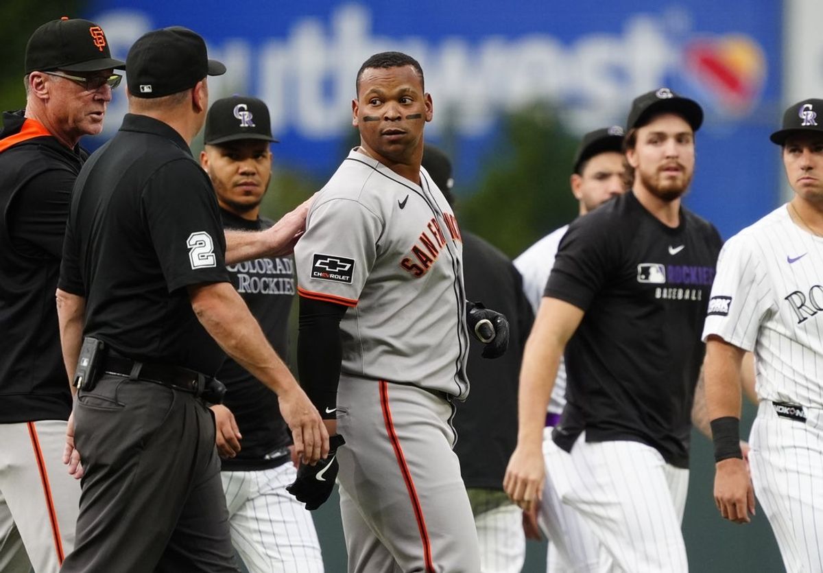 Sep 2, 2025; Denver, Colorado, USA; San Francisco Giants third baseman Rafael Devers (16) following a bench clearing in the first inning against the Colorado Rockies at Coors Field. Mandatory Credit: Ron Chenoy-Imagn Images