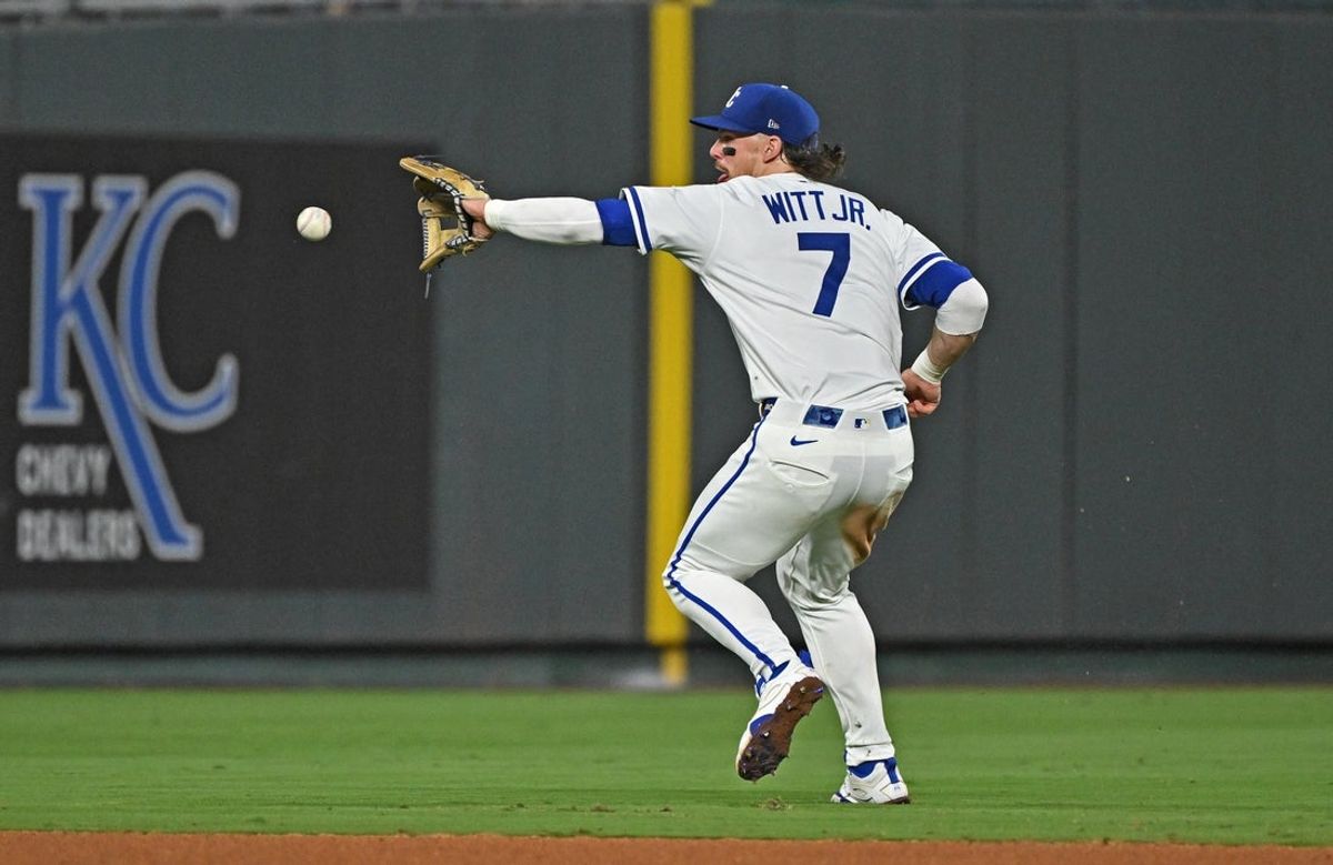 Sep 2, 2025; Kansas City, Missouri, USA;  Kansas City Royals shortstop Bobby Witt Jr. (7) fields the ball in the ninth inning against the Los Angeles Angels at Kauffman Stadium. Mandatory Credit: Peter Aiken-Imagn Images