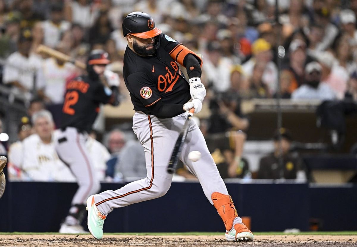 Sep 2, 2025; San Diego, California, USA; Baltimore Orioles third baseman Emmanuel Rivera (26) hits an RBI single during the fifth inning against the San Diego Padres at Petco Park. Mandatory Credit: Denis Poroy-Imagn Images
