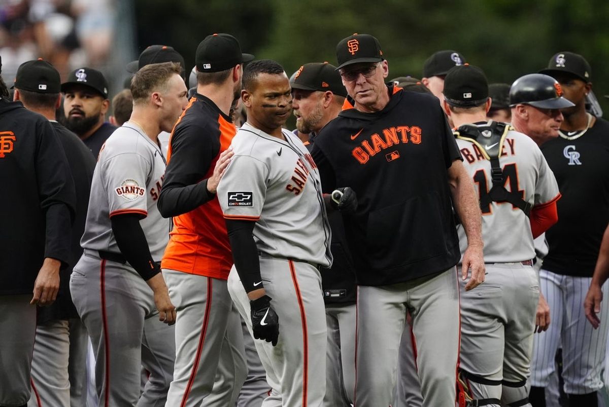 Sep 2, 2025; Denver, Colorado, USA; San Francisco Giants designated hitter Rafael Devers (16) and manager Bob Melvin (6) during a bench clearing in the first inning against the Colorado Rockies  at Coors Field. Mandatory Credit: Ron Chenoy-Imagn Images