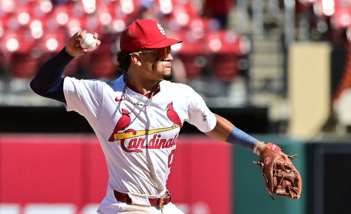 Aug 28, 2025; St. Louis, Missouri, USA; St. Louis Cardinals shortstop Masyn Winn (0) throws to first base in a game against the Pittsburgh Pirates at Busch Stadium. Mandatory Credit: Tim Vizer-Imagn Images