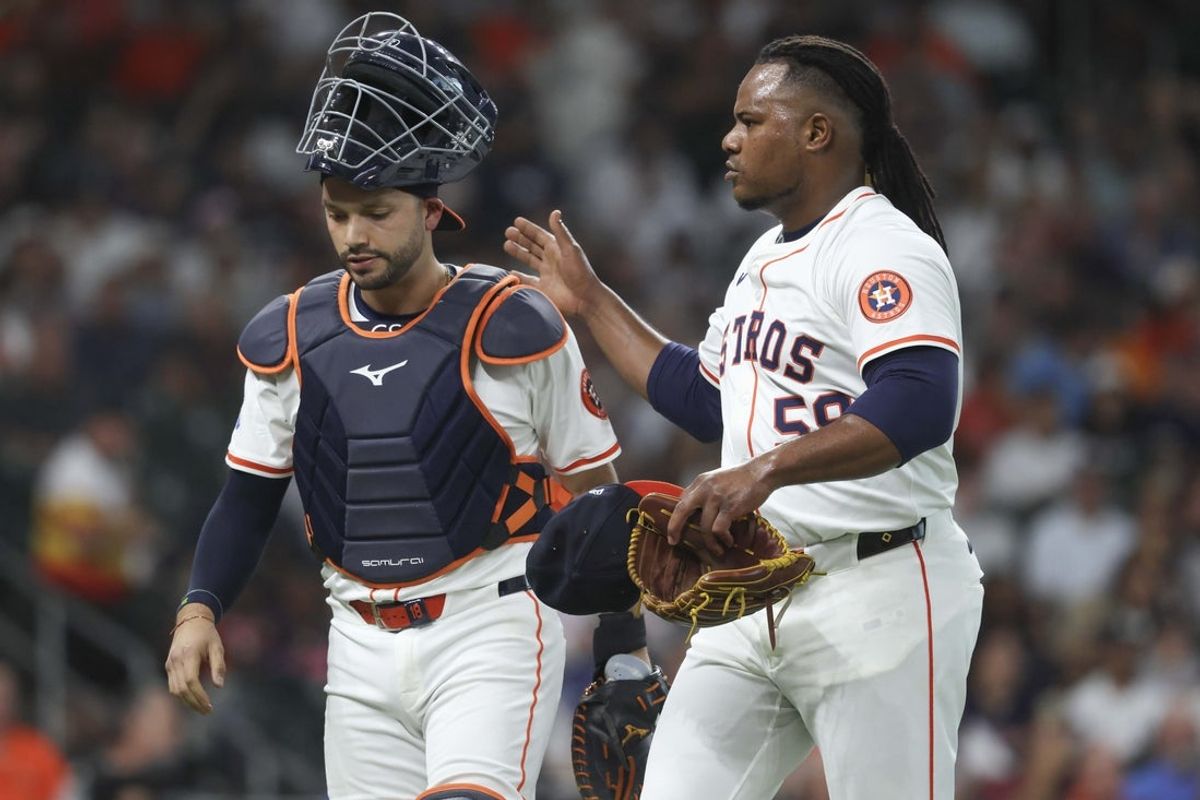 Sep 2, 2025; Houston, Texas, USA; Houston Astros starting pitcher Framber Valdez (59) and catcher Cesar Salazar (18) react while walking off the field during the first inning against the New York Yankees at Daikin Park. Mandatory Credit: Troy Taormina-Imagn Images