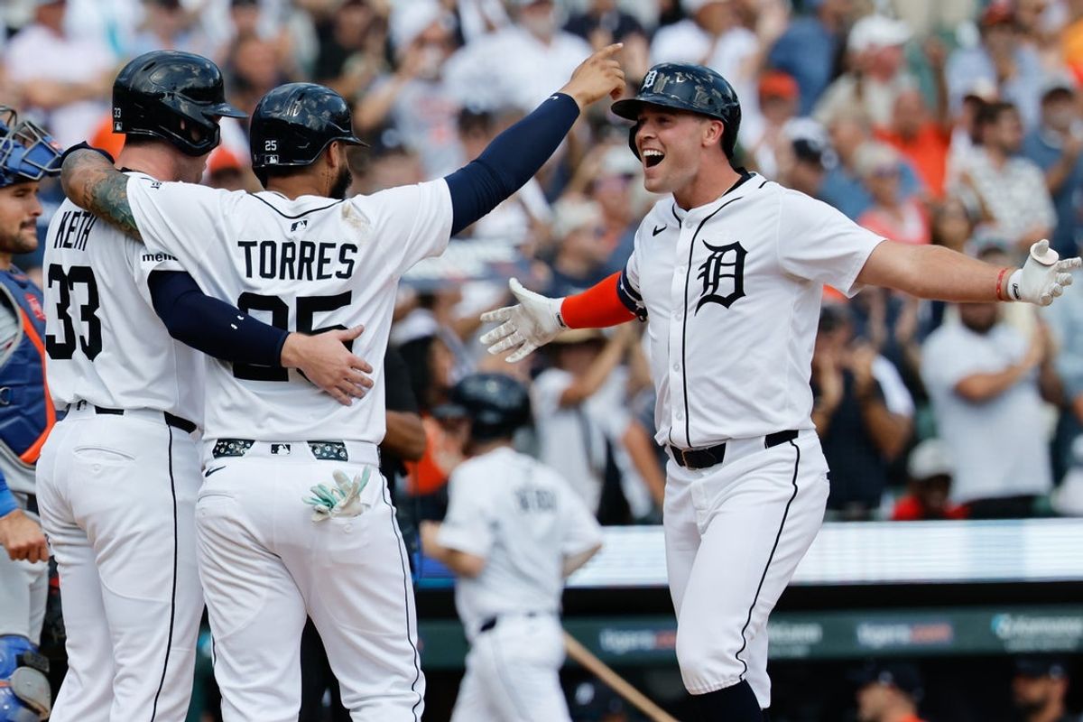 Sep 3, 2025; Detroit, Michigan, USA;  Detroit Tigers outfielder Kerry Carpenter (30) celebrates with second base Gleyber Torres (25) and second base Colt Keith (33) after he hits a three run home run in the seventh inning against the New York Mets at Comerica Park. Mandatory Credit: Rick Osentoski-Imagn Images