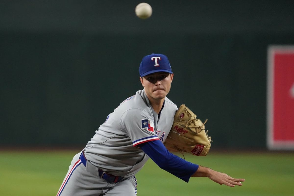 Sep 3, 2025; Phoenix, Arizona, USA; Texas Rangers pitcher Jack Leiter (35) throws against the Arizona Diamondbacks in the first inning at Chase Field. Mandatory Credit: Rick Scuteri-Imagn Images