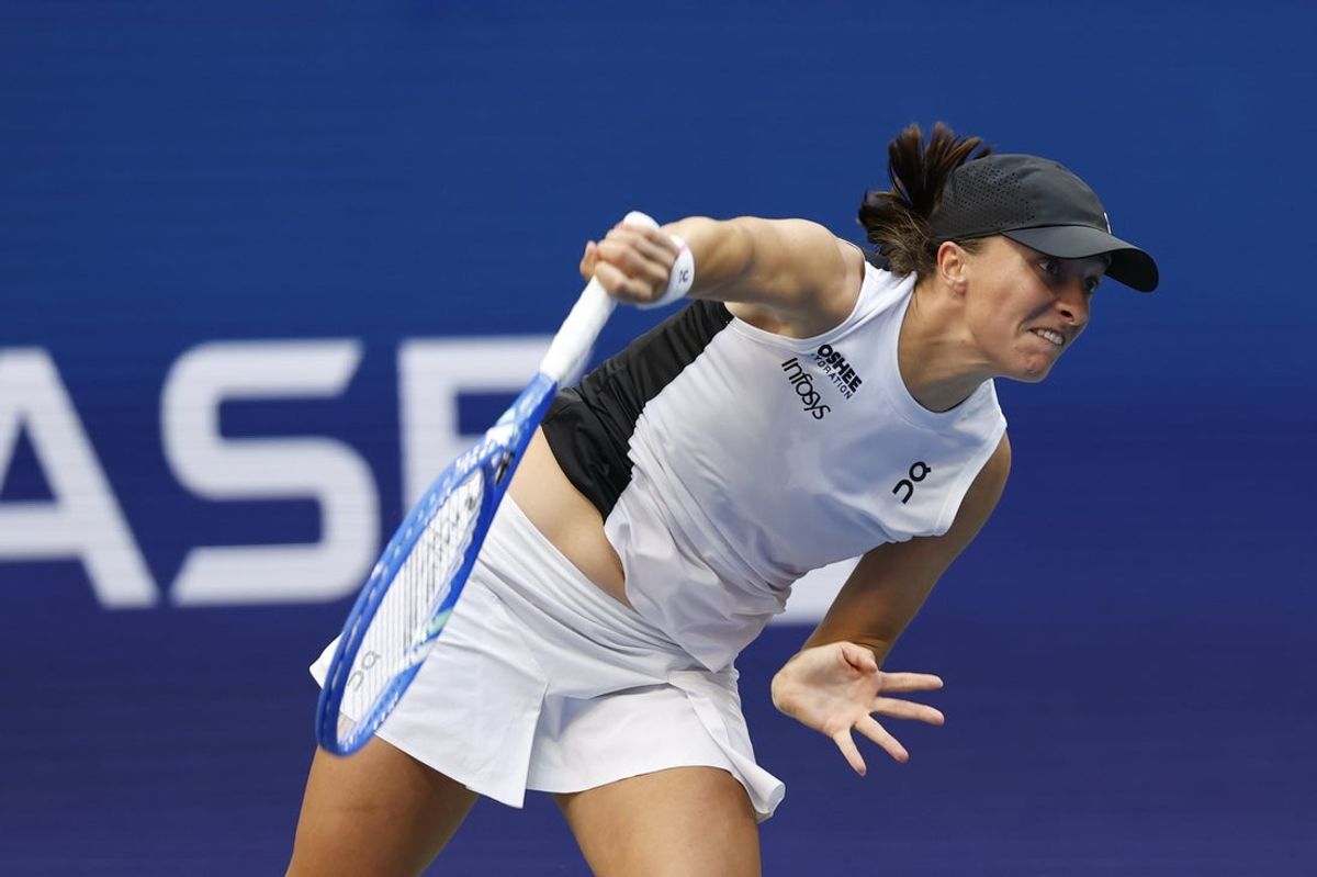 Sep 3, 2025; Flushing, NY, USA; Iga Swiatek (POL) serves against Amanda Anisimova (USA) (not pictured) on day eleven of the 2025 US Open tennis championships at USTA Billie Jean King National Tennis Center. Mandatory Credit: Geoff Burke-Imagn Images