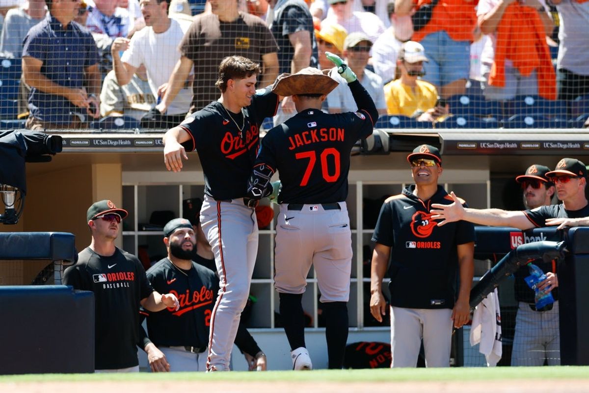 Sep 3, 2025; San Diego, California, USA; Baltimore Orioles catcher Alex Jackson (70) celebrates in the dugout after hitting a one run home run during the third inning against the San Diego Padres at Petco Park. Mandatory Credit: David Frerker-Imagn Images