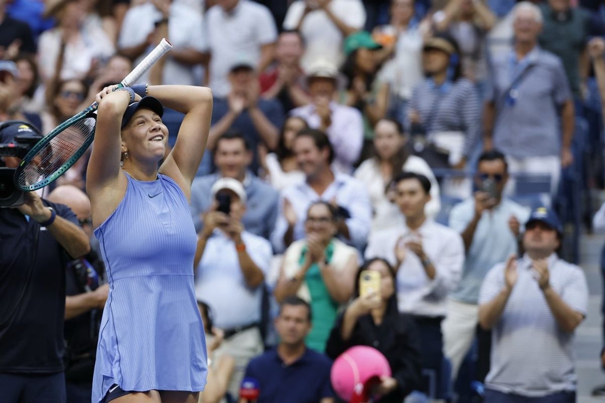 Sep 3, 2025; Flushing, NY, USA; Amanda Anisimova (USA) celebrates after her match against Iga Swiatek (POL) (not pictured) on day eleven of the 2025 US Open tennis championships at USTA Billie Jean King National Tennis Center. Mandatory Credit: Geoff Burke-Imagn Images