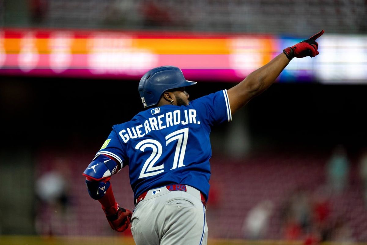 Toronto Blue Jays first baseman Vladimir Guerrero Jr. (27) reacts to hitting a home run in the fifth inning between the Cincinnati Reds and Toronto Blue Jays at Great American Ball Park in Cincinnati on Sept. 3, 2025.