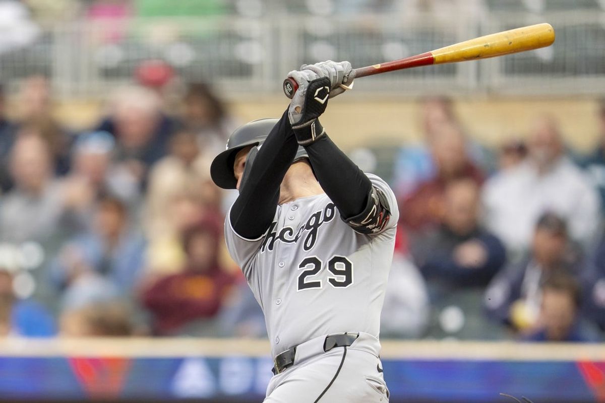 Sep 3, 2025; Minneapolis, Minnesota, USA; Chicago White Sox third baseman Curtis Mead (29) hits a single against the Minnesota Twins in the second inning at Target Field. Mandatory Credit: Jesse Johnson-Imagn Images