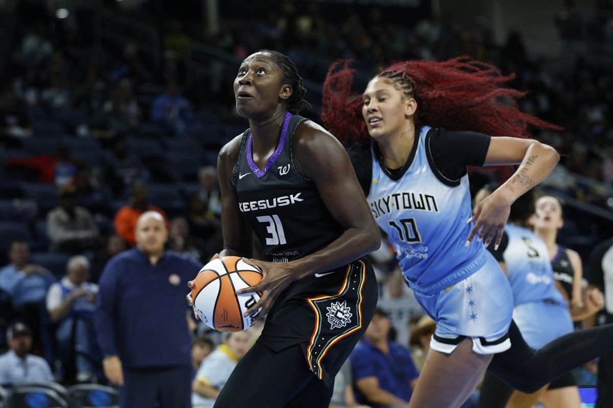 Sep 3, 2025; Chicago, Illinois, USA; Connecticut Sun center Tina Charles (31) drives to the basket against Chicago Sky center Kamilla Cardoso (10) during the first half at Wintrust Arena. Mandatory Credit: Kamil Krzaczynski-Imagn Images