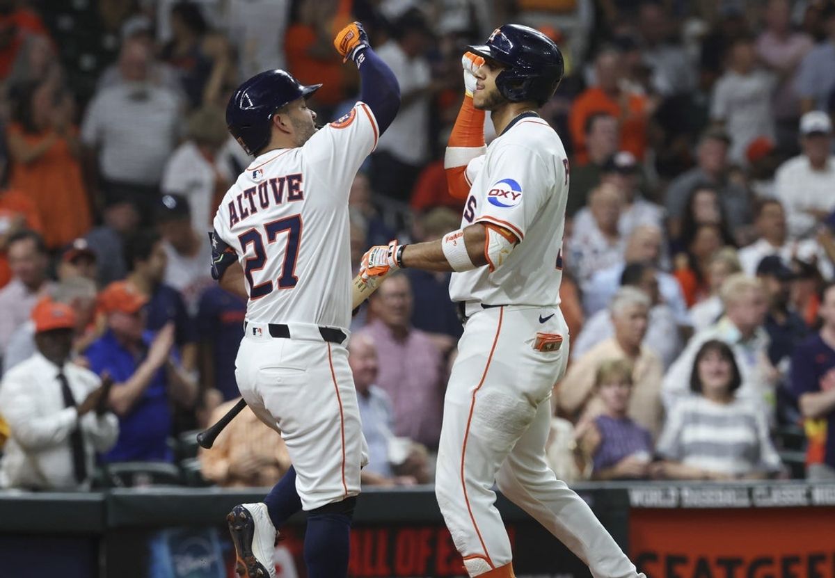 Sep 3, 2025; Houston, Texas, USA; Houston Astros shortstop Jeremy Pena (3) celebrates with designated hitter Jose Altuve (27) after hitting a home run during the sixth inning against the New York Yankees at Daikin Park. Mandatory Credit: Troy Taormina-Imagn Images