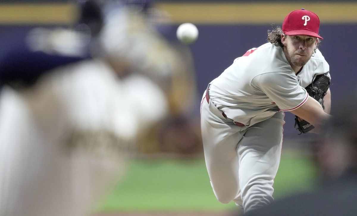 Sep 3, 2025; Milwaukee, Wisconsin, USA; Philadelphia Phillies pitcher Aaron Nola (27) throws during the first inning of their game against the Milwaukee Brewers at American Family Field. Mandatory Credit: Mark Hoffman-USA TODAY Network via Imagn Images