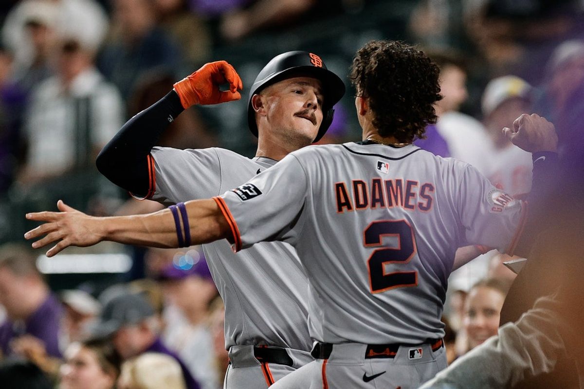 Sep 3, 2025; Denver, Colorado, USA; San Francisco Giants third baseman Matt Chapman (26) celebrates his three run home run with shortstop Willy Adames (2) in the sixth inning against the Colorado Rockies at Coors Field. Mandatory Credit: Isaiah J. Downing-Imagn Images
