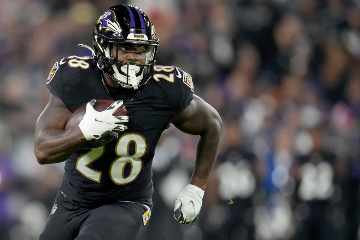 Baltimore Ravens running back Mike Davis (28) carries the ball in the second quarter during an NFL Week 5 game against the Cincinnati Bengals, Sunday, Oct. 9, 2022, at M&T Bank Stadium in Baltimore.

Nfl Cincinnati Bengals At Baltimore Ravens Oct 9 0176