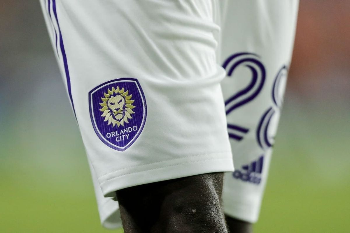 Sep 2, 2023; Cincinnati, Ohio, USA; The Orlando City SC logo on the uniform of defender Abdi Salim (28) during the second half in the game against FC Cincinnati at TQL Stadium.