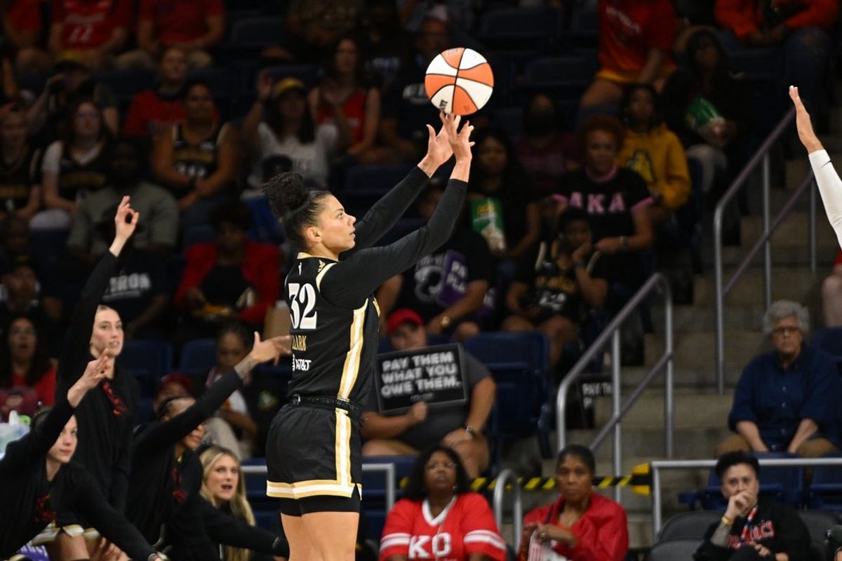 Sep 4, 2025; Washington, District of Columbia, USA;  Washington Mystics forward Alysha Clark (32) attempts a three-point basket against the Phoenix Mercury during the first quarter at CareFirst Arena. Mandatory Credit: Rafael Suanes-Imagn Images