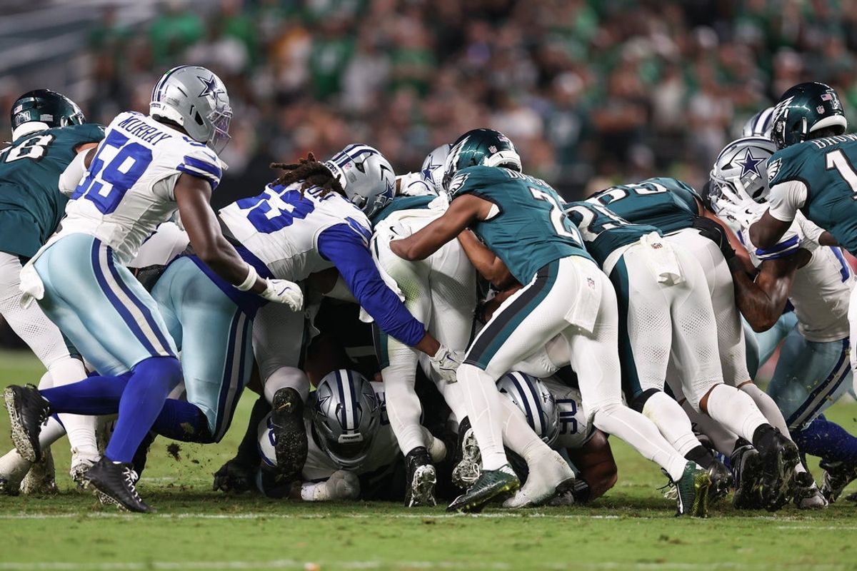Sep 4, 2025; Philadelphia, Pennsylvania, USA; The Philadelphia Eagles execute a tush push for a first down against the Dallas Cowboys during the fourth quarter of the game at Lincoln Financial Field. Mandatory Credit: Bill Streicher-Imagn Images