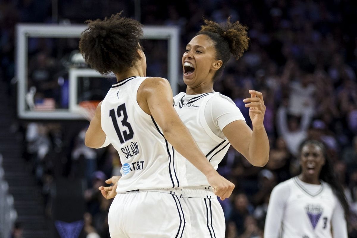 Sep 4, 2025; San Francisco, California, USA;  Golden State Valkyries forward Janelle Salaun (13) is congratulated by center Iliana Rupert (12) after she scored against the Dallas Wings during the second half at Chase Center. Mandatory Credit: John Hefti-Imagn Images