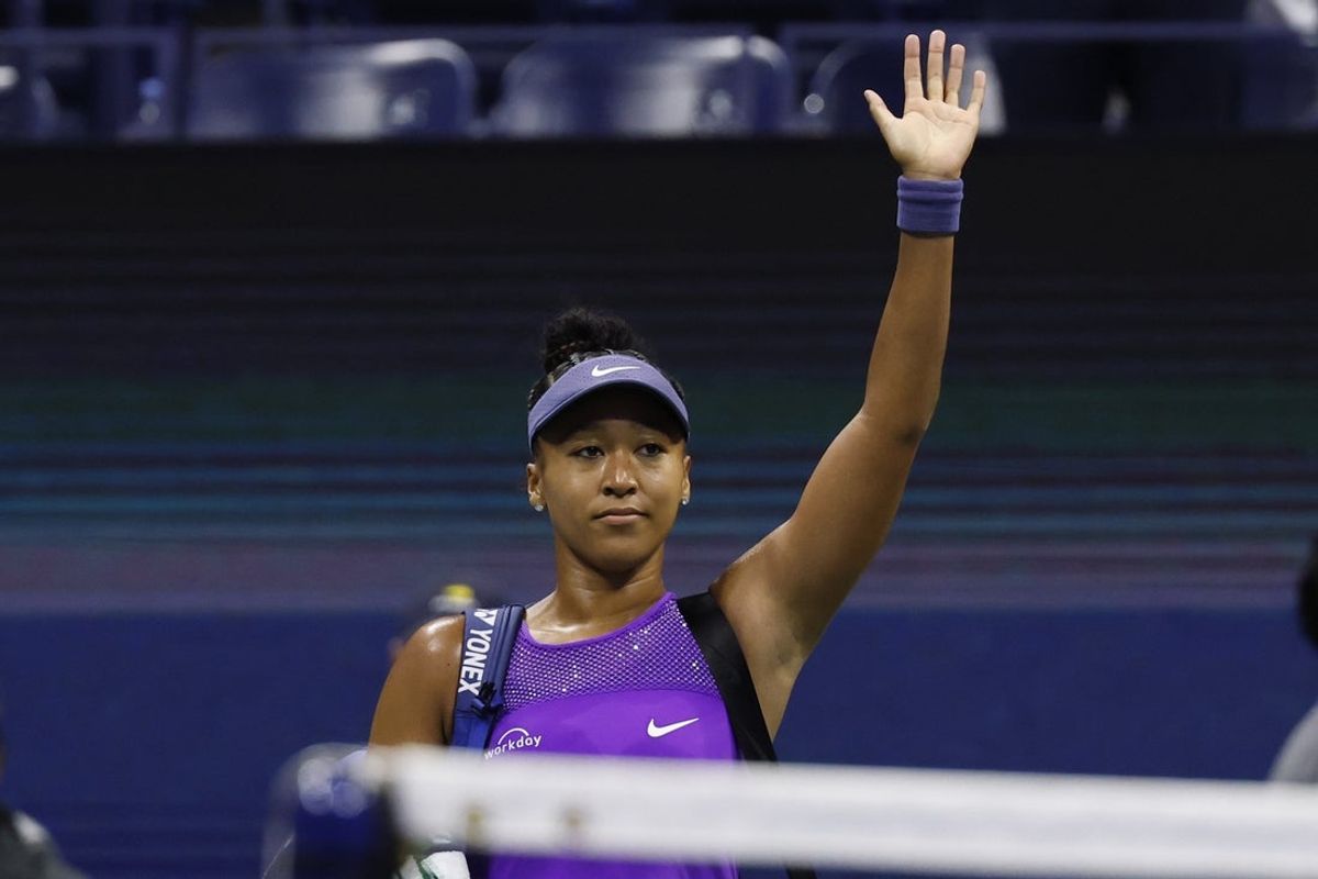 Sep 4, 2025; Flushing, NY, USA; Naomi Osaka (JPN) waves to the crowd while leaving the court after her match against Amanda Anisimova (USA) (not pictured) in a women's singles semifinal of the 2025 US Open tennis championships at USTA Billie Jean King National Tennis Center. Mandatory Credit: Geoff Burke-Imagn Images