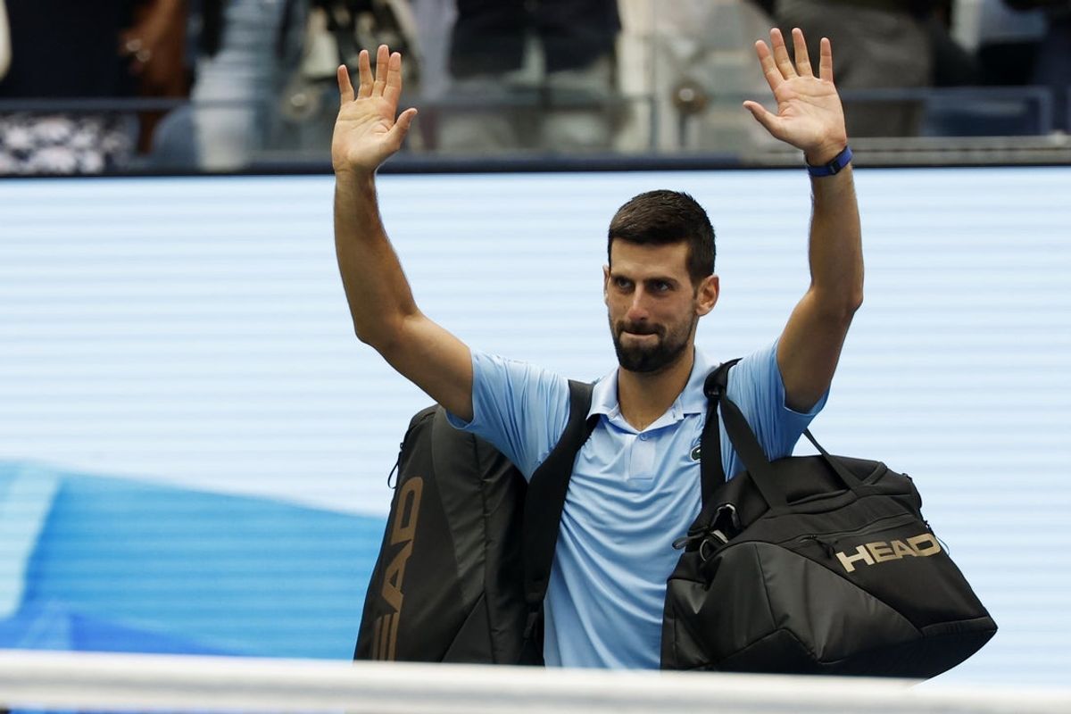 Sep 5, 2025; Flushing, NY, USA; Novak Djokovic (SRB) waves to the crowd while leaving the court after his match against Carlos Alcaraz (ESP) (not pictured) in a men's singles semifinal on day thirteen of the 2025 US Open tennis championships at USTA Billie Jean King National Tennis Center. Mandatory Credit: Geoff Burke-Imagn Images