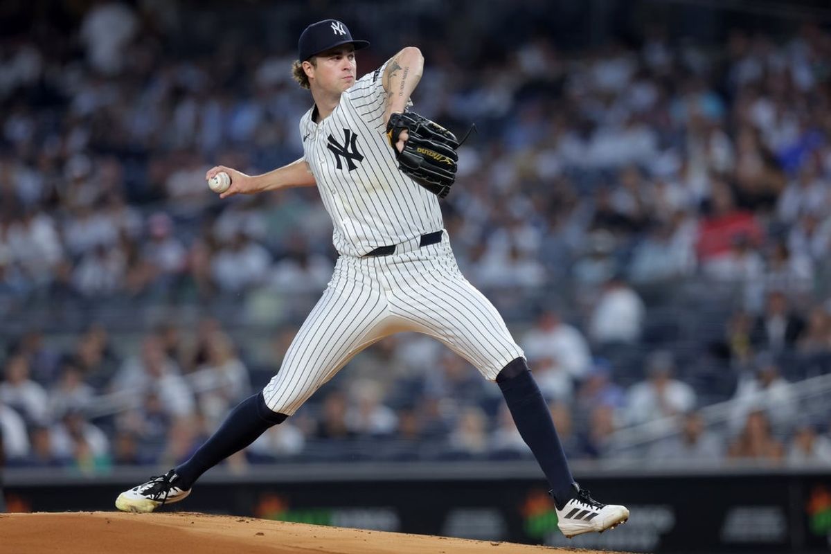 Sep 5, 2025; Bronx, New York, USA; New York Yankees starting pitcher Cam Schlittler (31) pitches against the Toronto Blue Jays during the first inning at Yankee Stadium. Mandatory Credit: Brad Penner-Imagn Images
