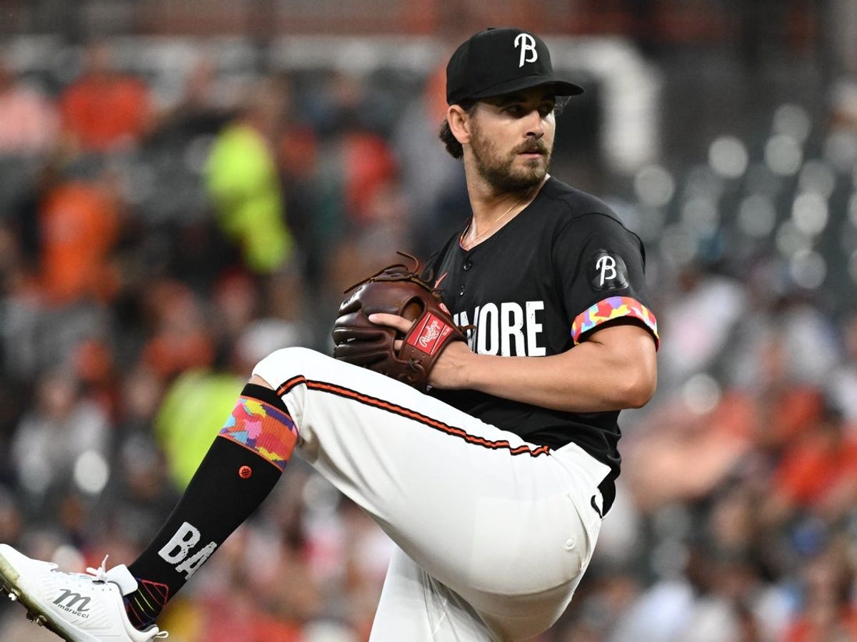 Sep 5, 2025; Baltimore, Maryland, USA;  Baltimore Orioles pitcher Dean Kremer (64) delivers a pitch during the first inning against the Los Angeles Dodgers at Oriole Park at Camden Yards. Mandatory Credit: James A. Pittman-Imagn Images