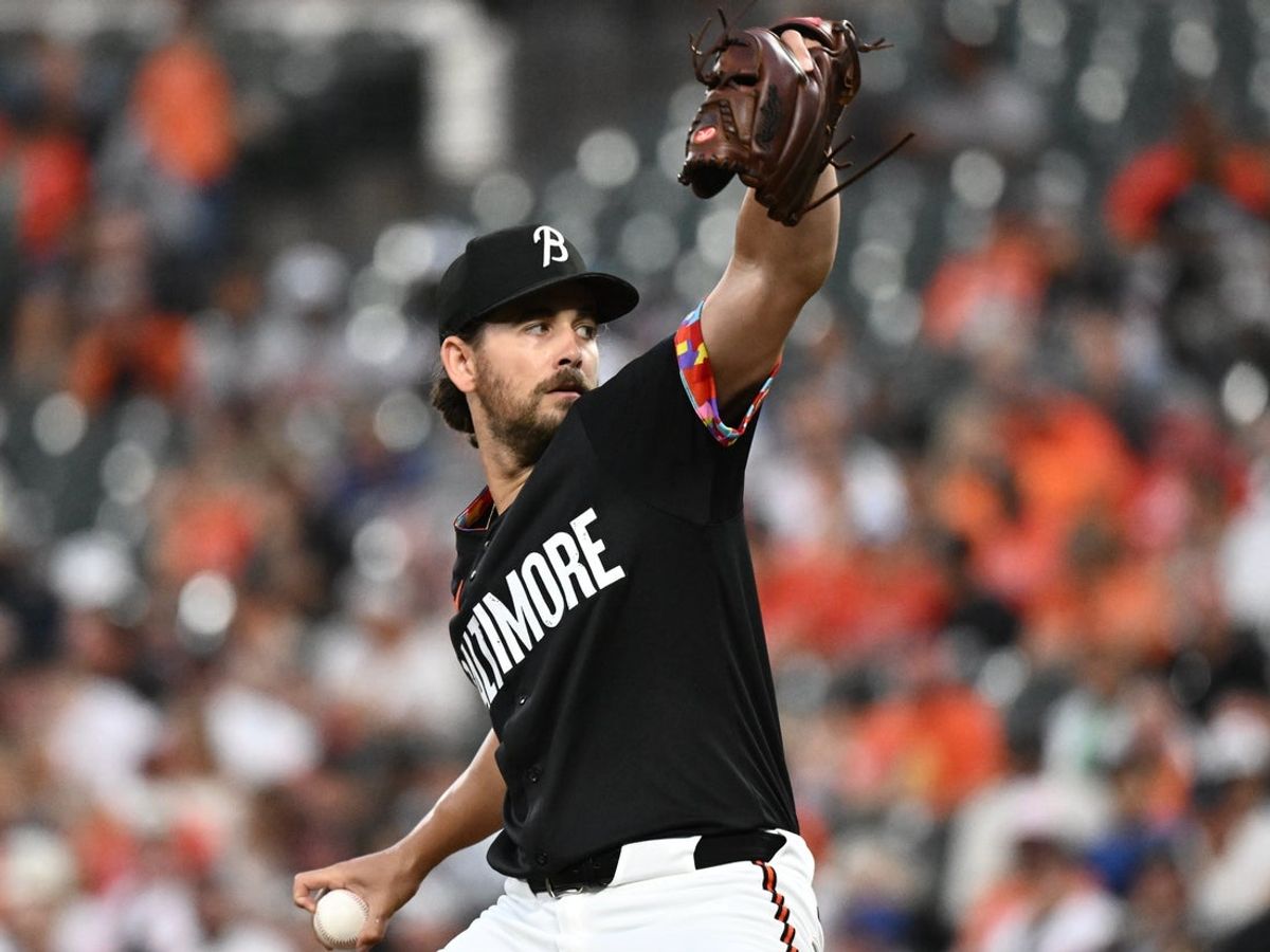 Sep 5, 2025; Baltimore, Maryland, USA;  Baltimore Orioles pitcher Dean Kremer (64) delivers a pitch during the first inning against the Los Angeles Dodgers at Oriole Park at Camden Yards. Mandatory Credit: James A. Pittman-Imagn Images