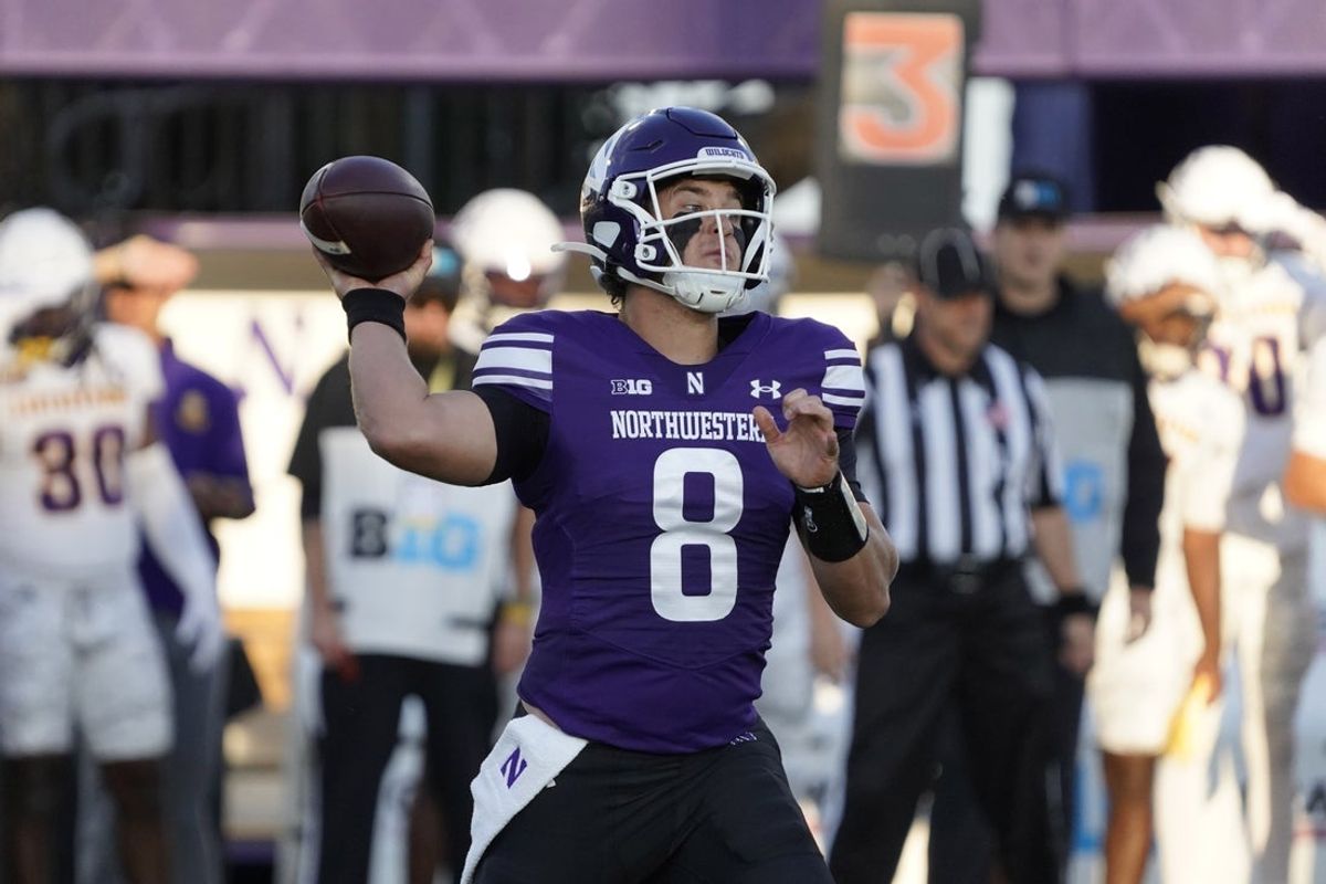 Sep 5, 2025; Evanston, Illinois, USA; Northwestern Wildcats quarterback Preston Stone (8) throws the ball against the Western Illinois Leathernecks during the first half at Northwestern Medicine Field at Martin Stadium. Mandatory Credit: David Banks-Imagn Images