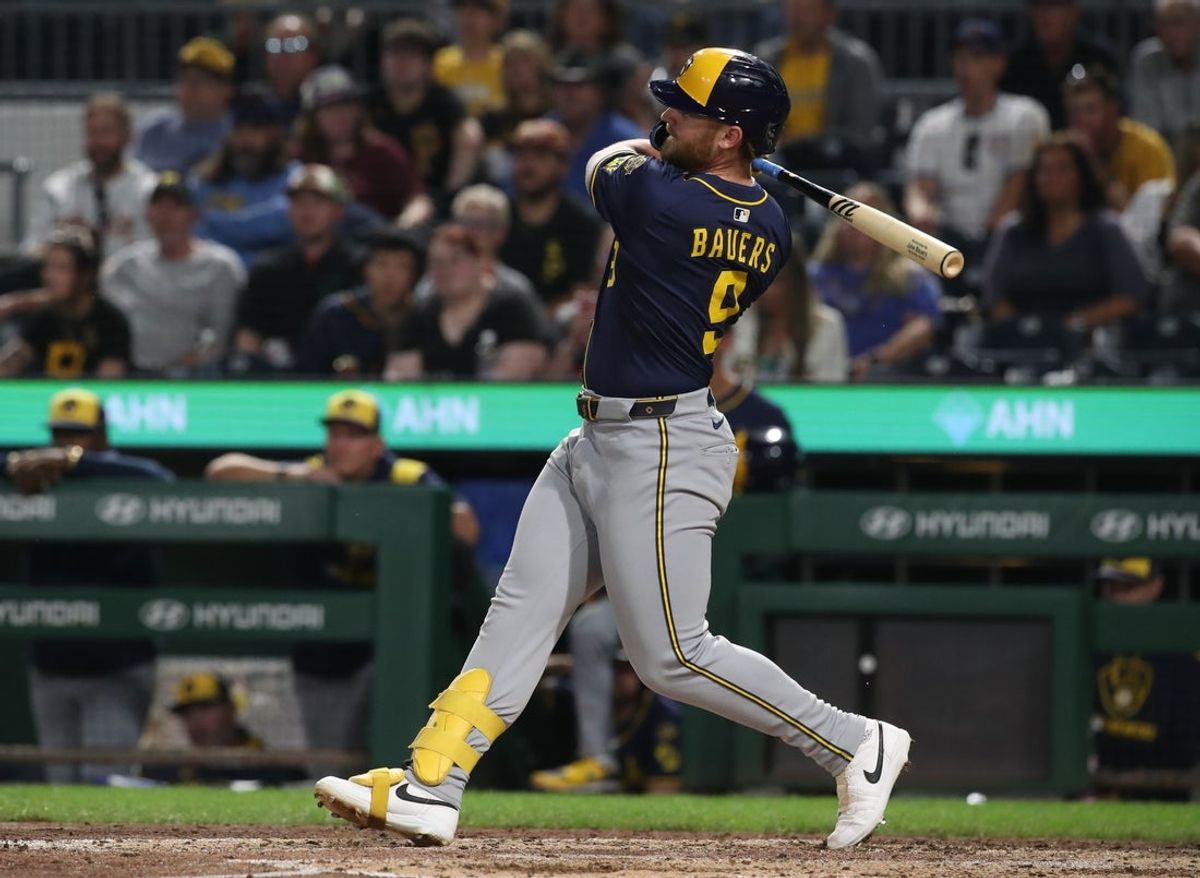 Sep 5, 2025; Pittsburgh, Pennsylvania, USA;  Milwaukee Brewers designated hitter Jake Bauers (9) hits a two run single against the Pittsburgh Pirates during the sixth inning at PNC Park. Mandatory Credit: Charles LeClaire-Imagn Images