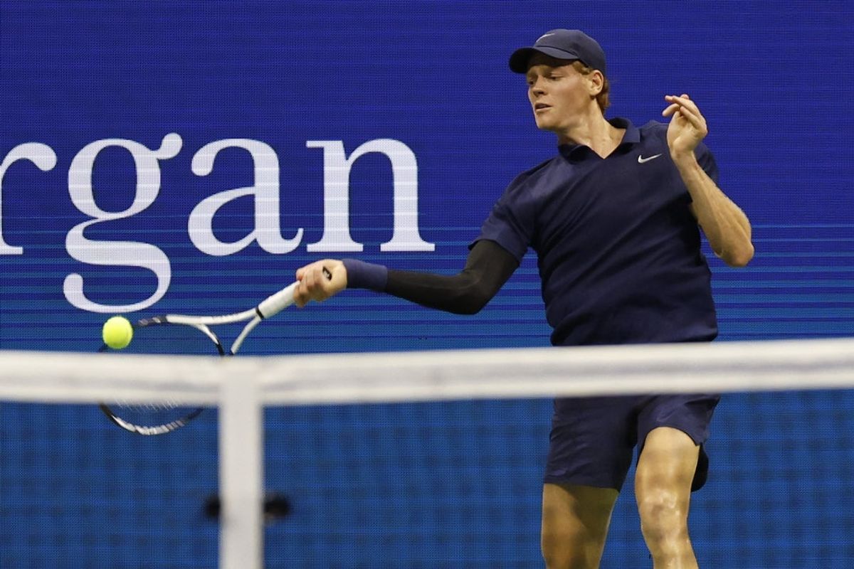 Sep 5, 2025; Flushing, NY, USA; Jannik Sinner (ITA) hits a forehand against Felix Auger-Aliassime (CAN) (not pictured) in a men's singles semifinal on day thirteen of the 2025 US Open tennis championships at USTA Billie Jean King National Tennis Center. Mandatory Credit: Geoff Burke-Imagn Images