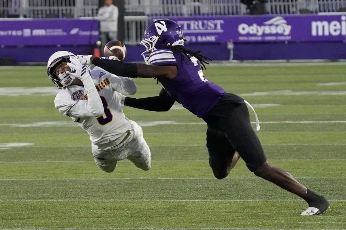 Sep 5, 2025; Evanston, Illinois, USA; Northwestern Wildcats defensive back Fred Davis II (2) defends Western Illinois Leathernecks wide receiver Demari Davis (3) during the first half at Northwestern Medicine Field at Martin Stadium. Mandatory Credit: David Banks-Imagn Images