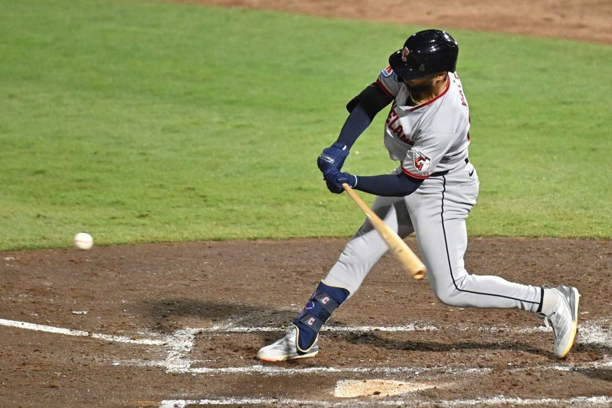 Sep 5, 2025; St. Petersburg, Florida, USA;  Cleveland Guardians pinch hitter George Valera (35) hits a RBI single  in the sixth inning against the Tampa Bay Rays  at George M. Steinbrenner Field. Mandatory Credit: Jonathan Dyer-Imagn Images