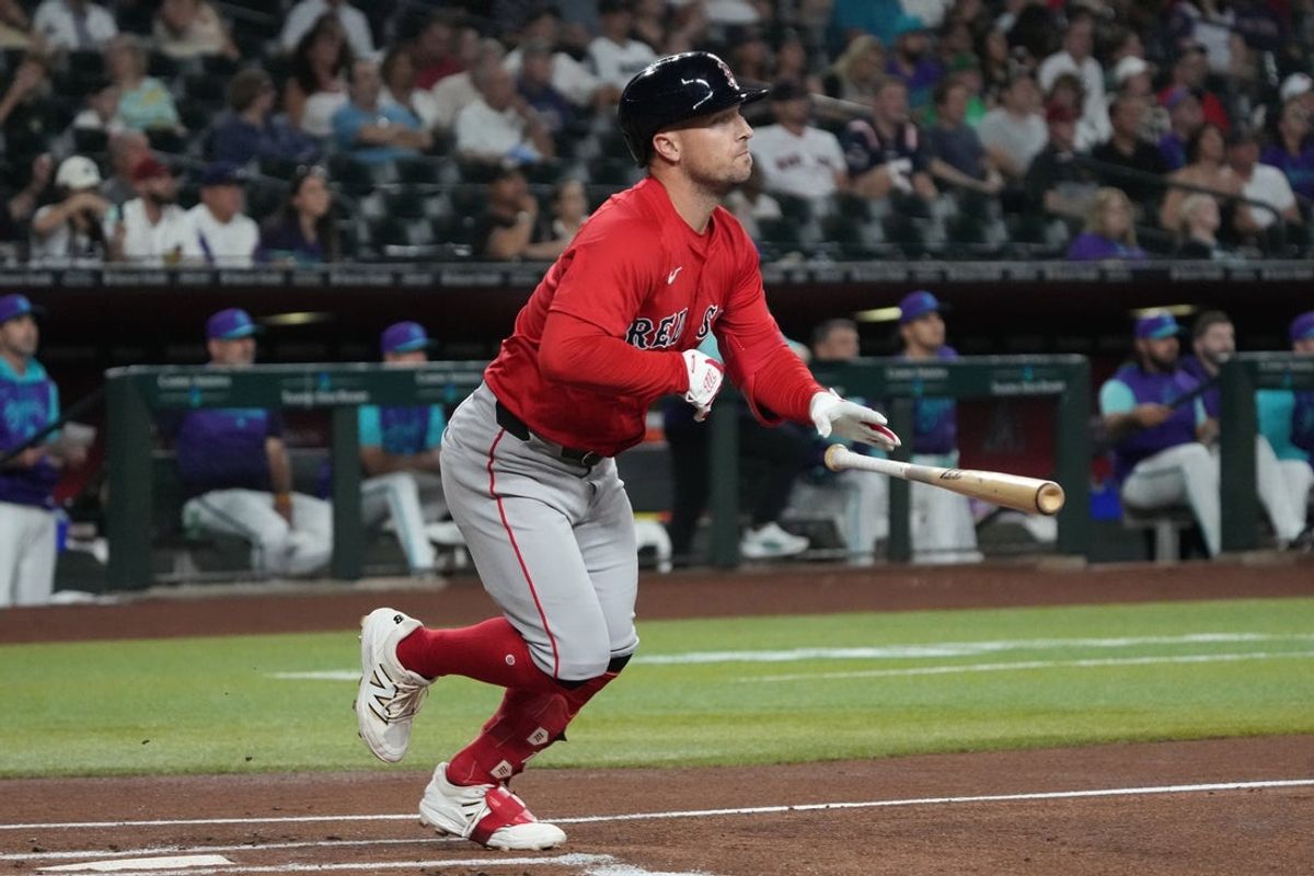 Sep 5, 2025; Phoenix, Arizona, USA; Boston Red Sox shortstop Trevor Story (10) hits against the Arizona Diamondbacks in the first inning at Chase Field. Mandatory Credit: Rick Scuteri-Imagn Images