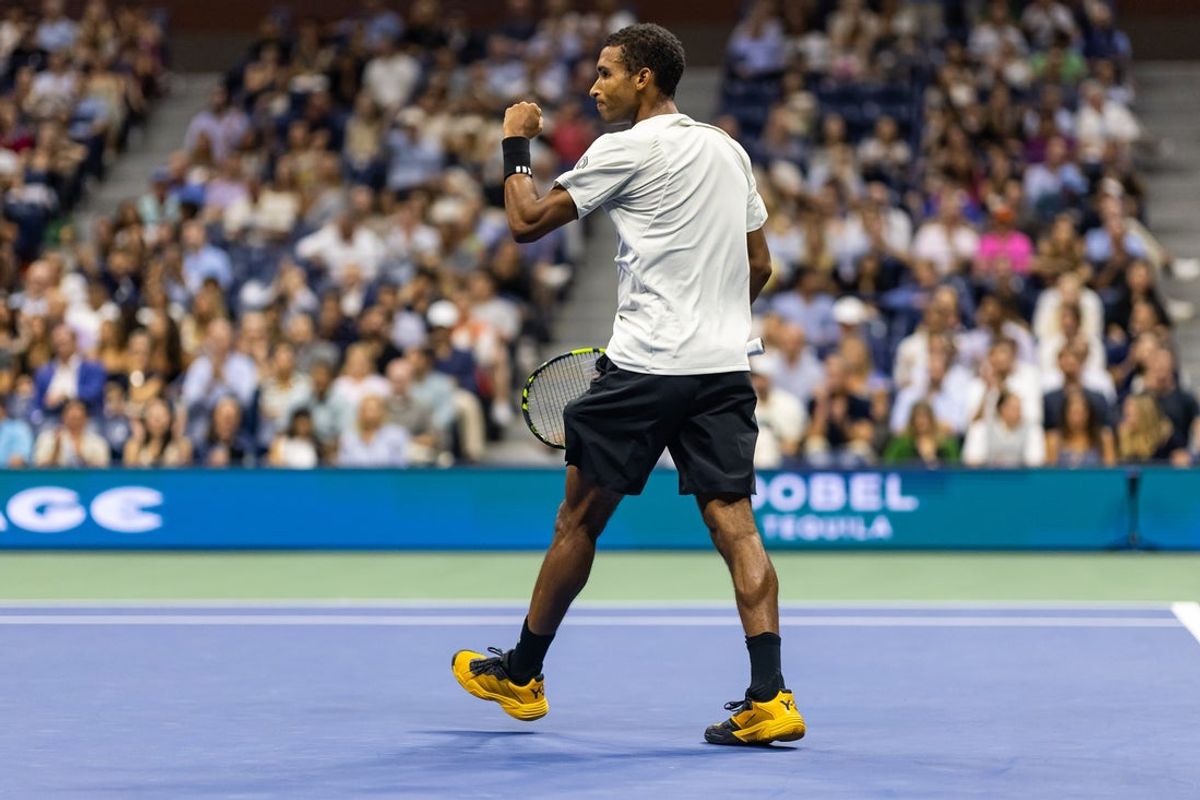 Sep 5, 2025; Flushing, NY, USA; Felix Auger-Aliassime of Canada in action against Jannik Sinner of Italy in the semifinal of the men’s singles at the US Open at Arthur Ashe Stadium in Billie Jean King National Tennis Center. Mandatory Credit: Mike Frey-Imagn Images