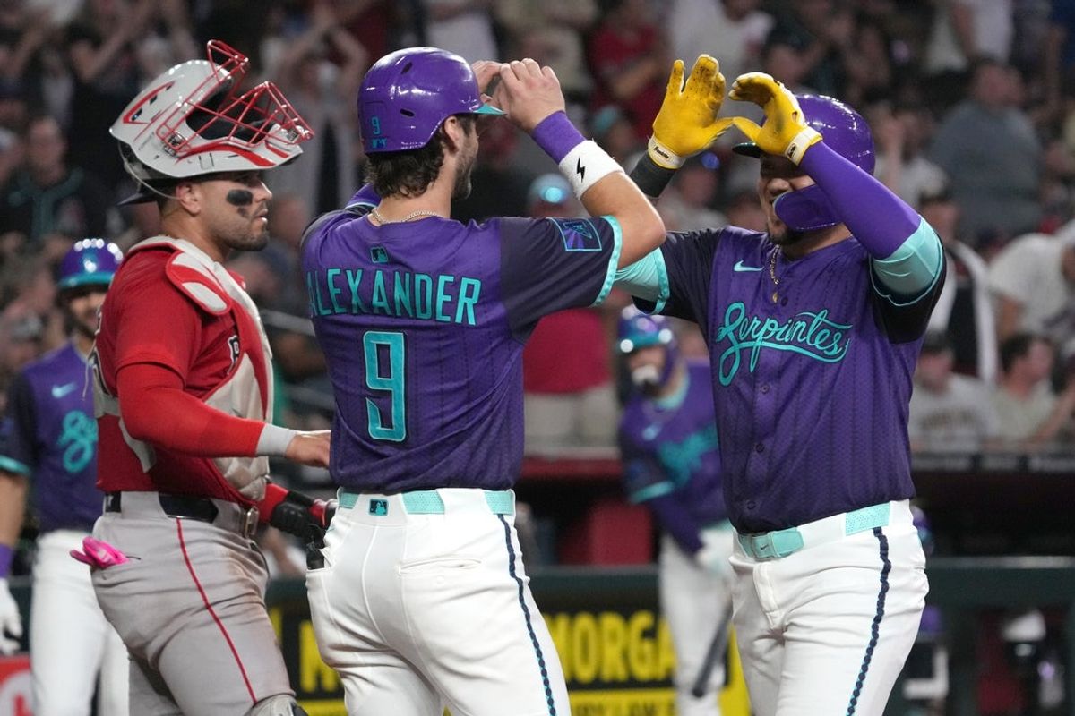 Sep 5, 2025; Phoenix, Arizona, USA; Arizona Diamondbacks second base Ildemaro Vargas (6) celebrates with shortstop Blaze Alexander (9) after hitting a three run home run against the Boston Red Sox in the third inning at Chase Field. Mandatory Credit: Rick Scuteri-Imagn Images