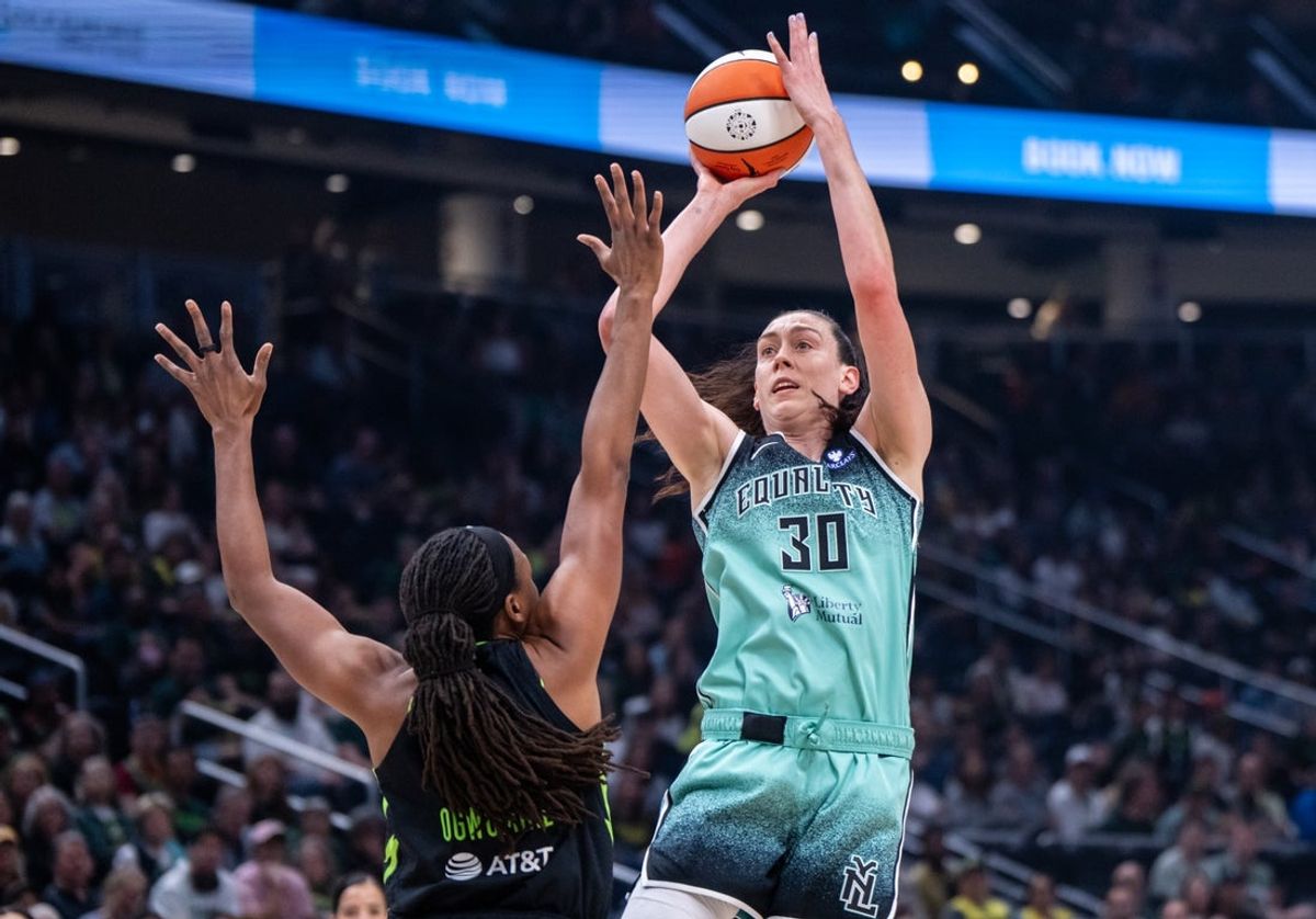 Sep 5, 2025; Seattle, Washington, USA;  New York Liberty forward Breanna Stewart (30) shoots the ball against Seattle Storm forward Nneka Ogwumike (3) during the first half at Climate Pledge Arena. Mandatory Credit: Stephen Brashear-Imagn Images