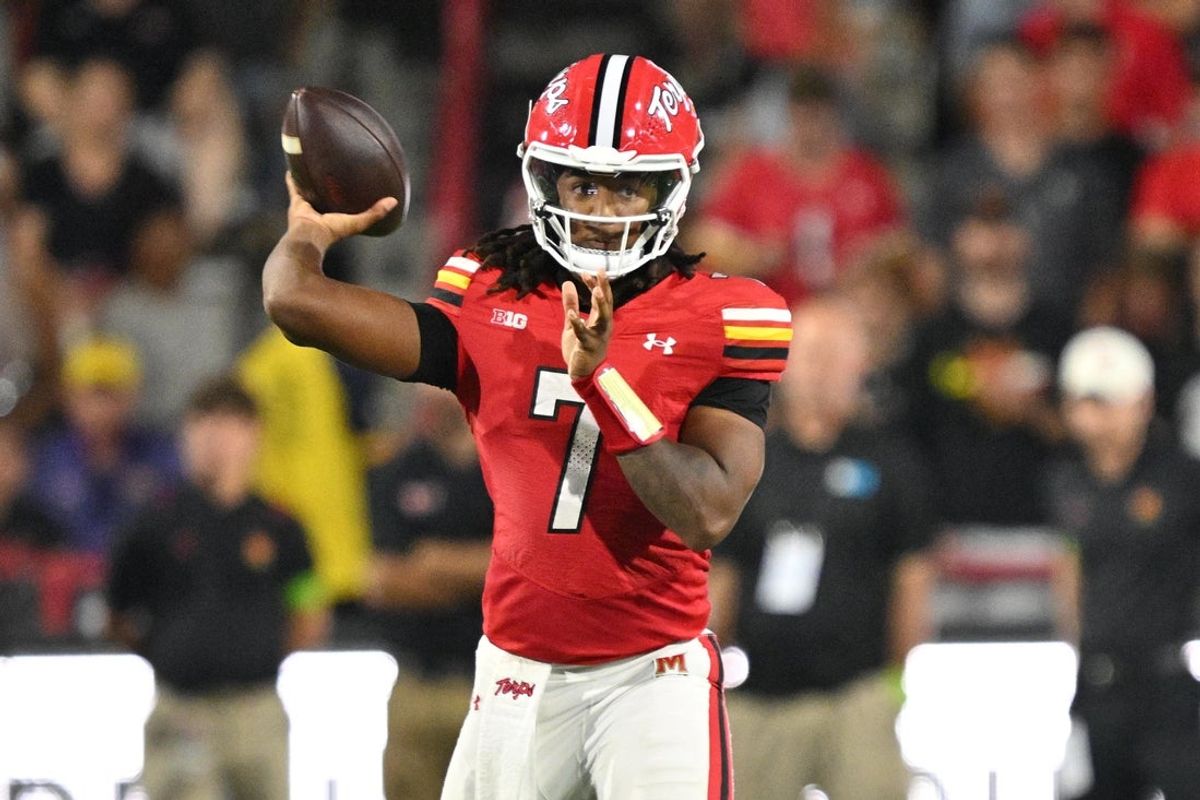 Sep 5, 2025; College Park, Maryland, USA;  Maryland Terrapins quarterback Malik Washington (7) passes in the first half against the Northern Illinois Huskies at SECU Stadium. Mandatory Credit: Jamie Sabau-Imagn Images